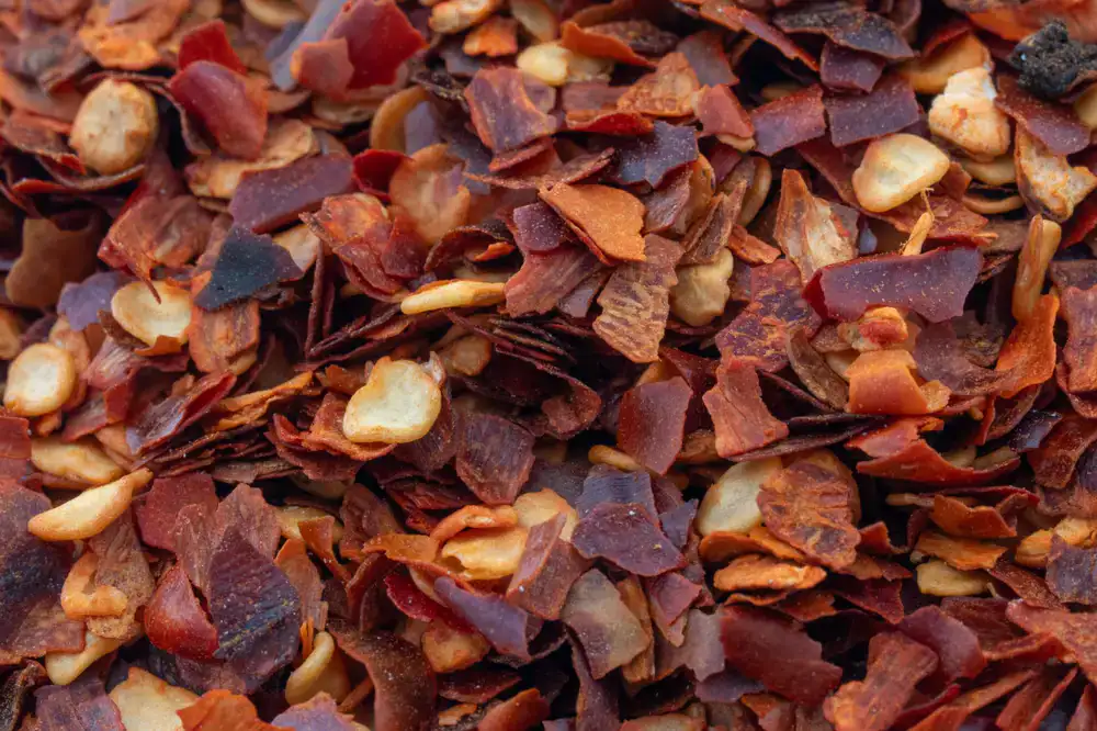 Close up macro shot of colorful crushed spices and sea salt