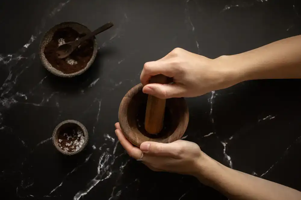 Grinding spices in a mortar