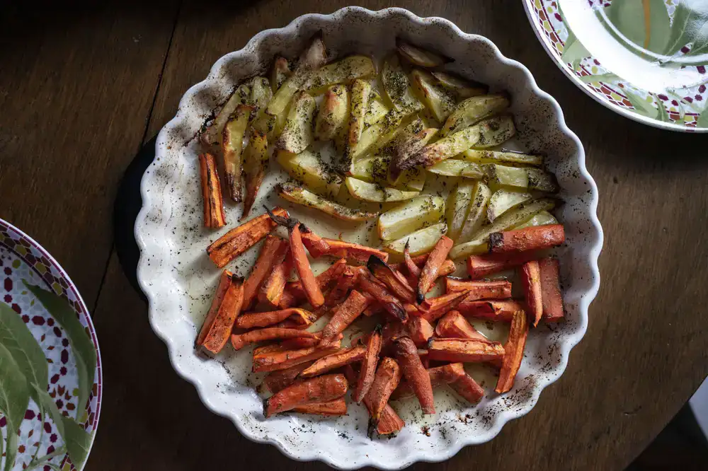 Roasted root vegetables coated in a dark spice rub
